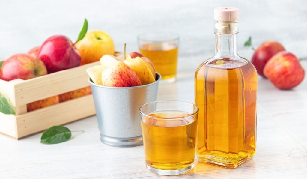 Apple cider vinegar in glass bottle 