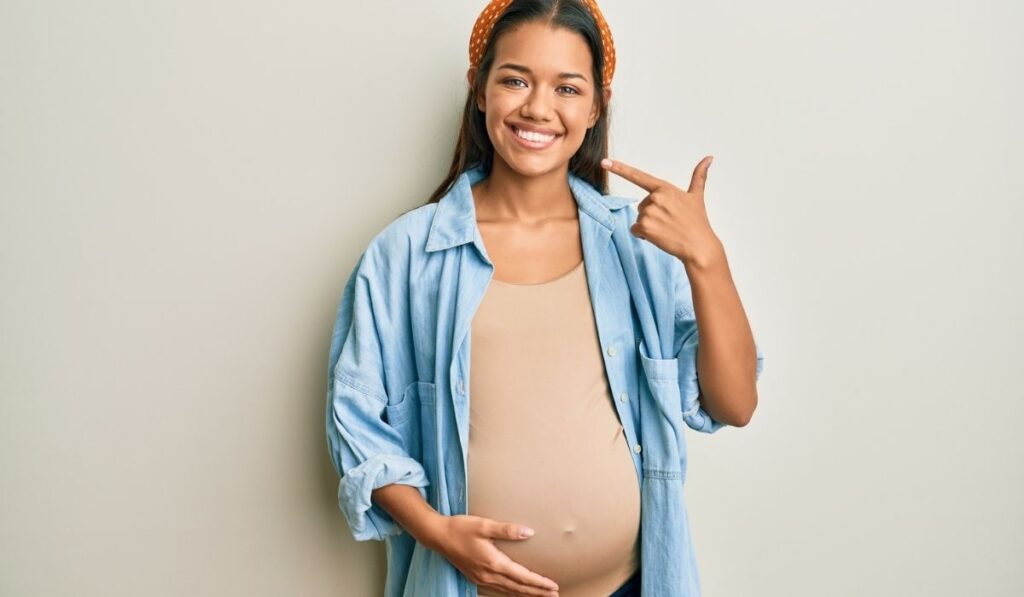 Beautiful hispanic woman expecting a baby 