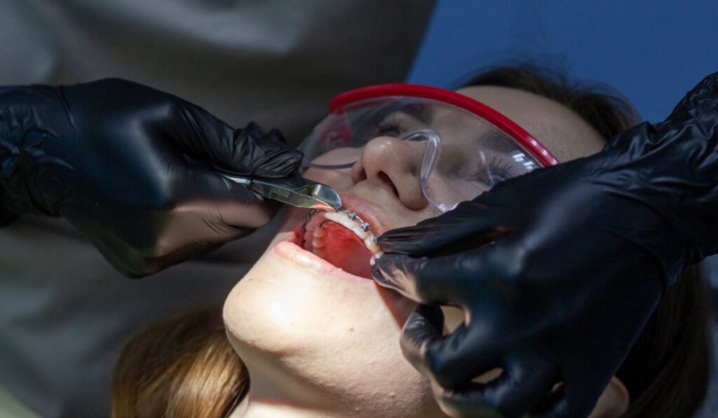 A woman at a dentist 