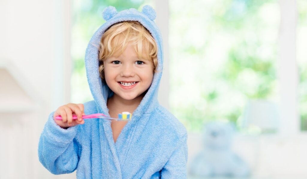 Child brushing teeth 