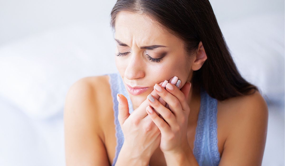 Woman Feeling Tooth Pain